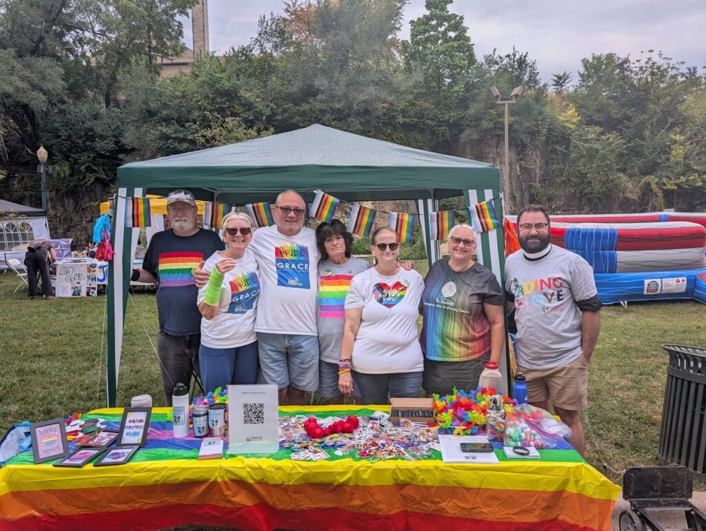 Grace parishioners and Fr. Bryan at the Grace Episcopal Church tent at Joliet Pride Fest